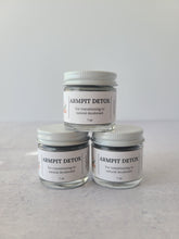 Charger l&#39;image dans la galerie, 3 one ounce glass jars of armpit detox powder stacked like a pyramid 
