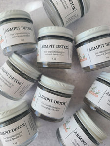 flat lay image of multiple armpit detox 1 ounce jars 